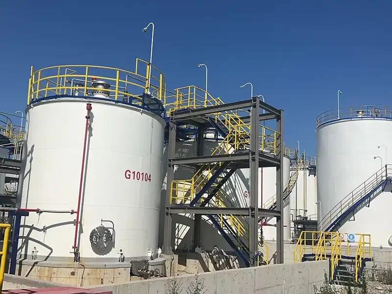 Modern quality control laboratory with technician analyzing TXIB samples using advanced testing equipment